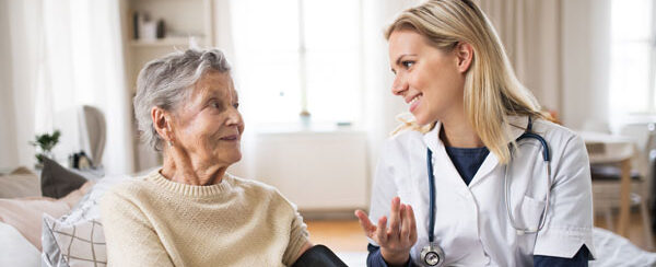 Home care nurse with patient