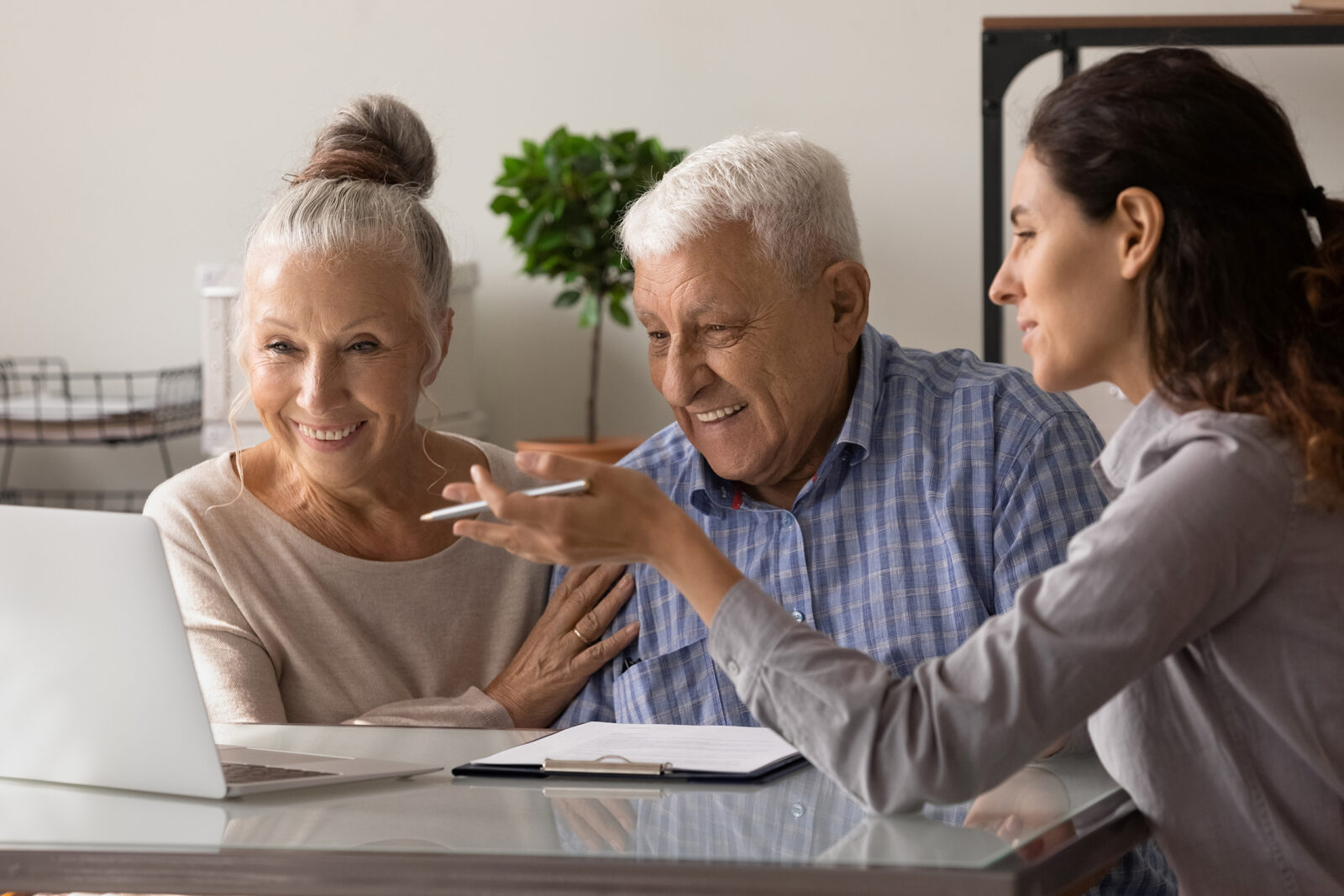 a care manager going over options with a senior couple